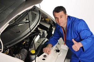Mechanic repairing car
